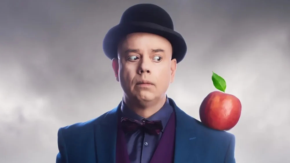 En magiker med ett äpple